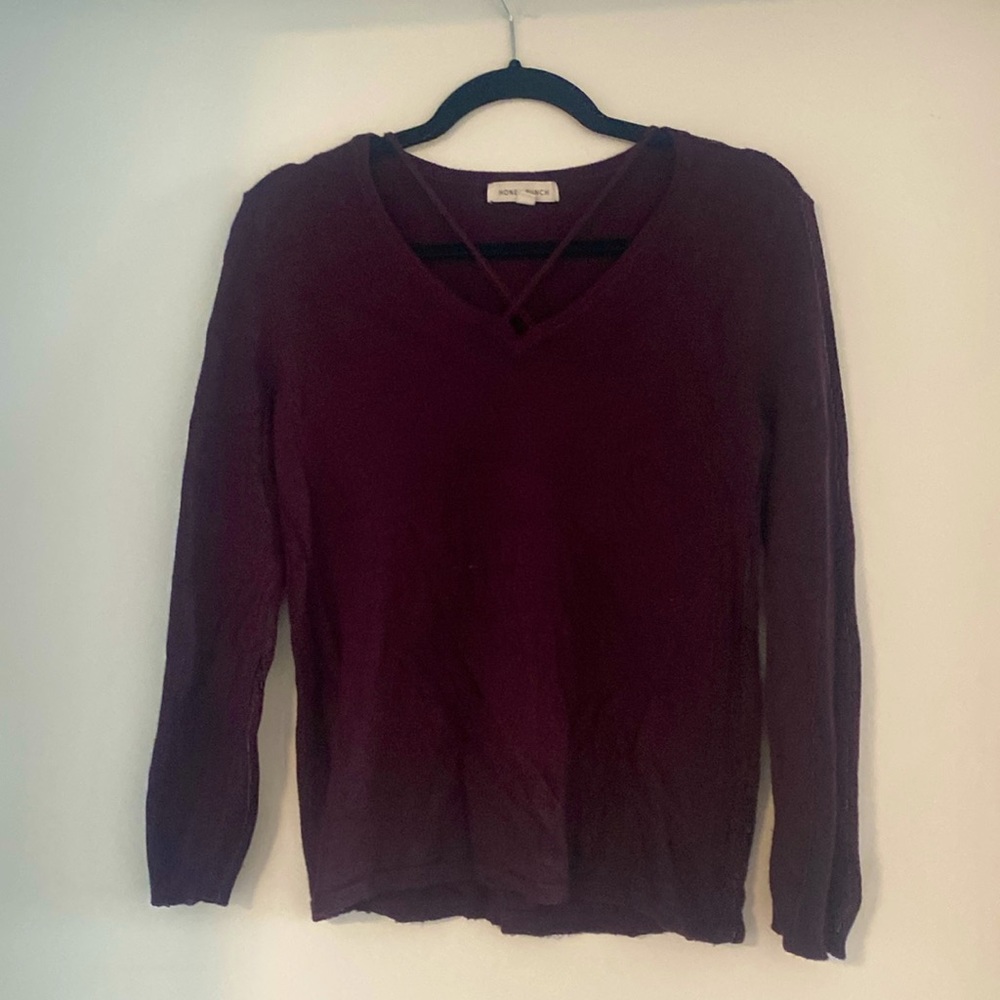 Purple sweater with unique neckline